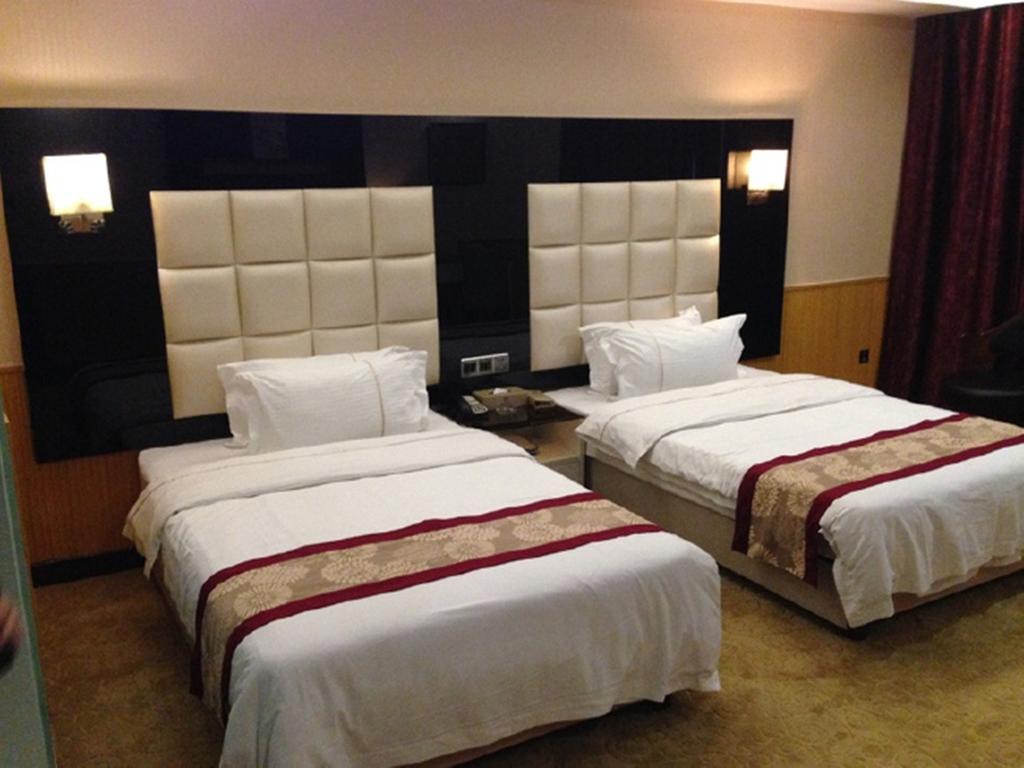 Tianguo Times Hotel Foshan Chambre photo